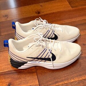 Nike White and Black Athletic Shoes with Blue Accents